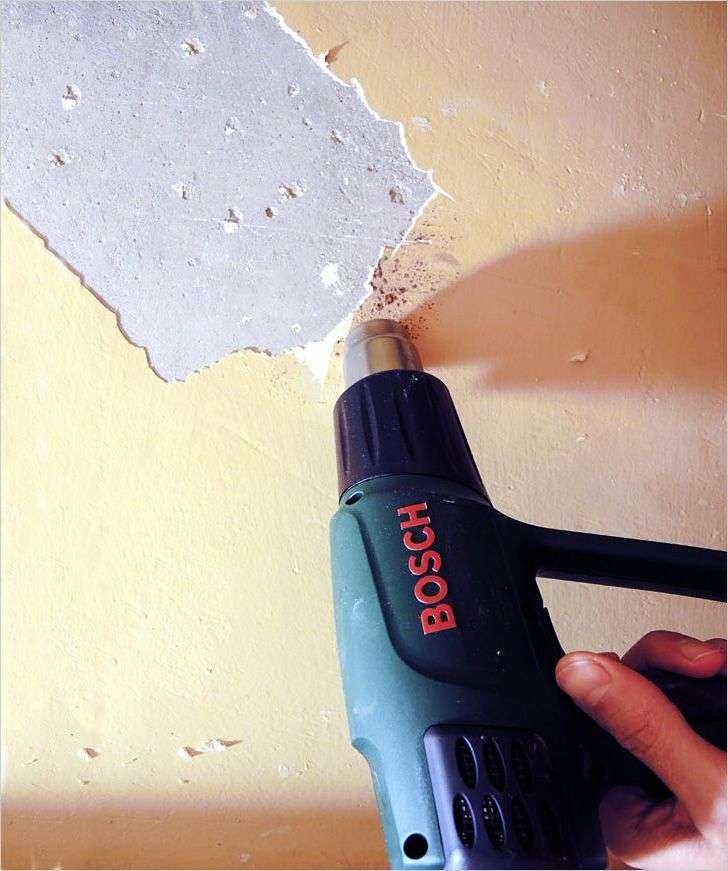Как снять старую краску со стен
